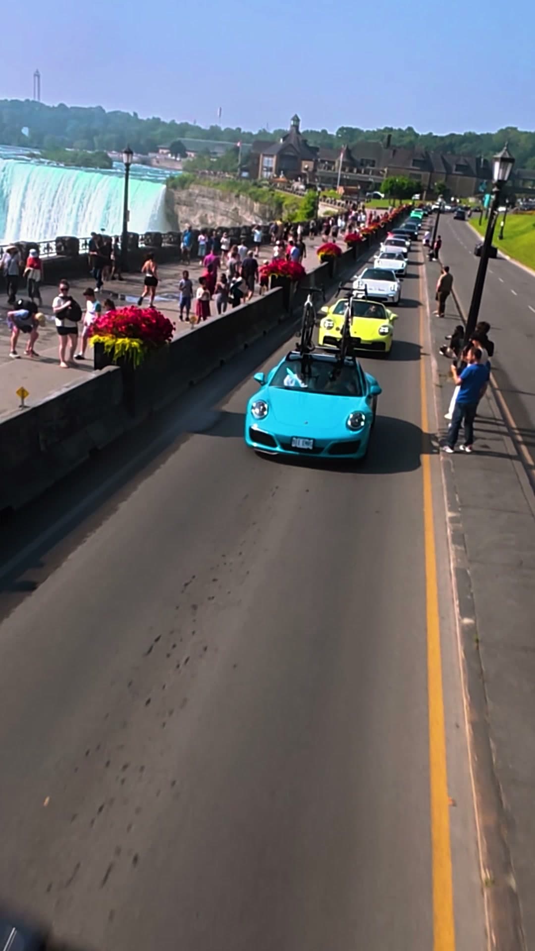Spectators lining the parade route at the falls